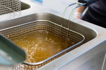 cooking french friesの写真素材