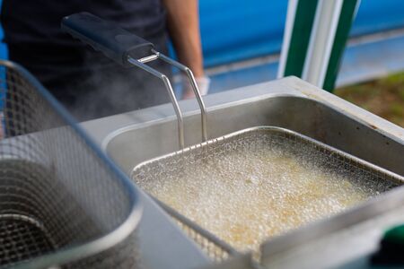 cooking french friesの写真素材