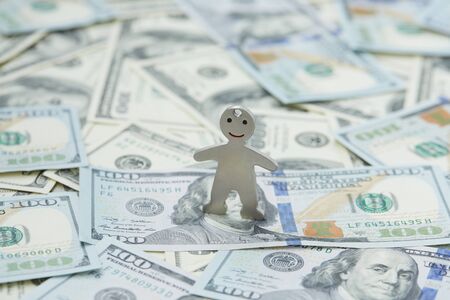 notes of dollars and little manの写真素材