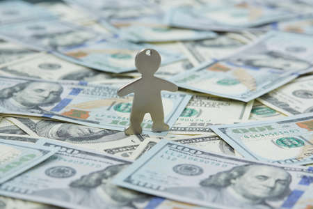 notes of dollars and little manの写真素材