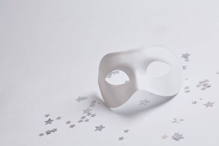 white venetian mask on a white backgroundの写真素材