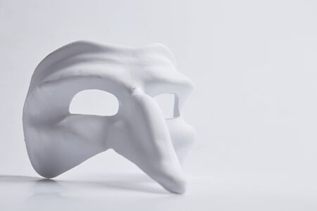 white venetian mask on a white backgroundの写真素材