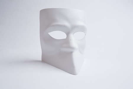 white venetian mask on a white backgroundの写真素材