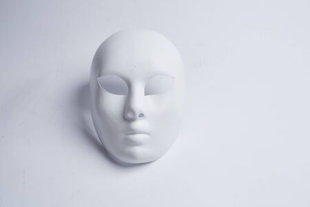 white venetian mask on a white backgroundの写真素材