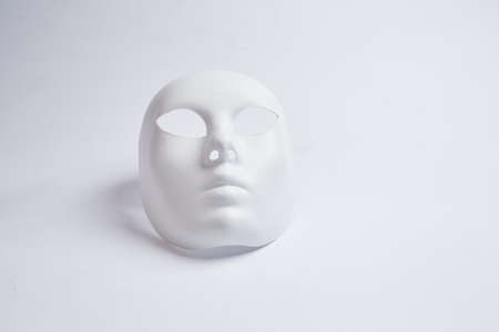 white venetian mask on a white backgroundの写真素材