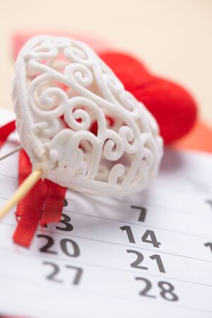 Hearts on the background of a calendarの写真素材