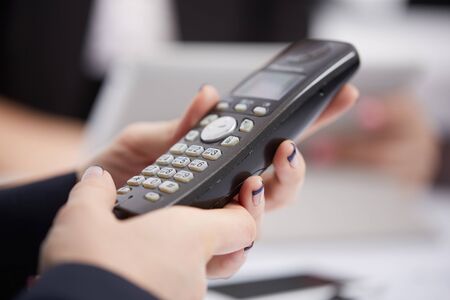 Radio phone in female hands