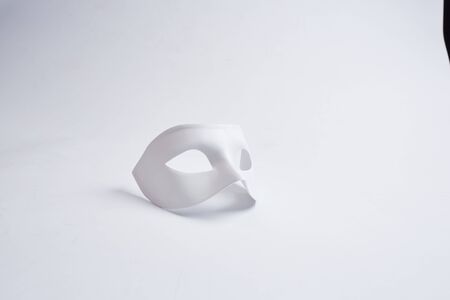 white venetian mask on a white backgroundの写真素材