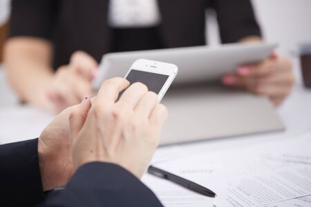 mobile phone in the women's handsの写真素材