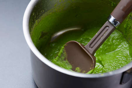 Cooking mashed green fresh peasの写真素材