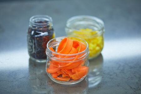 Food ingredients in jars vegetables, cerealsの写真素材