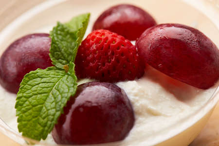 healthy food curd dessert with grape strawberryの写真素材
