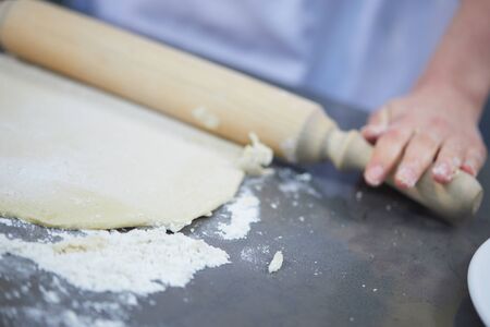 knead, roll out the doughの写真素材