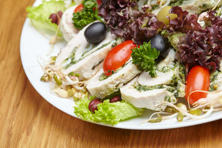 dietary meal roll with chicken breast and vegetablesの写真素材