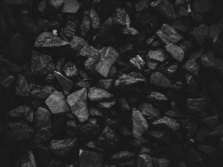 black coal texture useful as a background with copy space for your text or imageの写真素材
