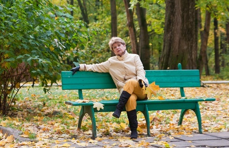 portrait of woman in autumn parkの写真素材