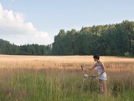Painter-girl en plein airの写真素材