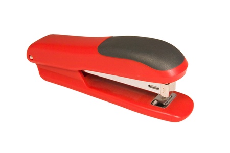 Red stapler isolated on a white backgroundの写真素材