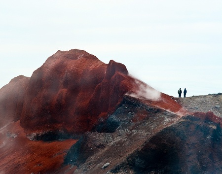 Tourists on the top of volcano. Kamchatkaの写真素材