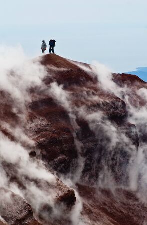 Tourists on the top of volcano. Kamchatkaの写真素材
