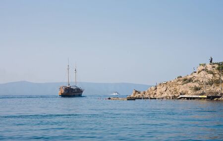 ship leaves the bay. Croatiaの写真素材