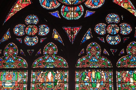 Fragment of stained glass windows in the cathedral of Notre Dame de Paris, Paris, Franceのeditorial素材