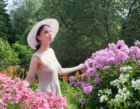 Beautiful girl with flowersの写真素材
