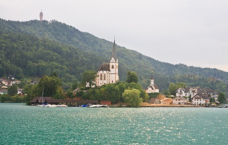 Resort Maria Worth  Church of St  Primus and Felician winter church  Austriaの写真素材