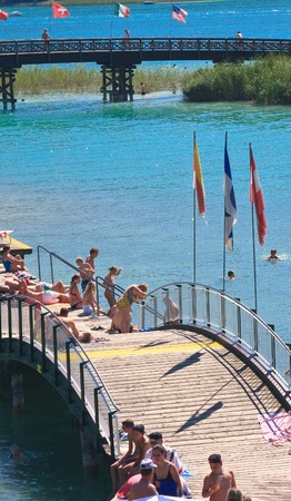 Beach on Lake Worth. Resort Portschach am Worthersee. Austriaのeditorial素材