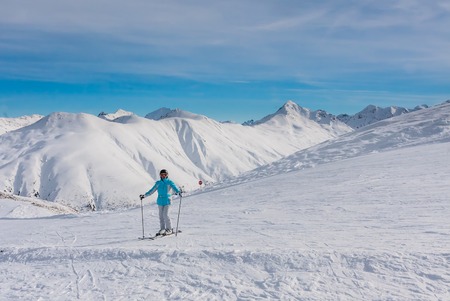 Skier mountains in the background. Ski resort Livigno. Italyのeditorial素材