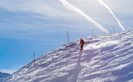 Skier on the slopes of the ski resortの写真素材