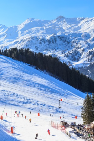 Skiers on the slopes of the ski resort of Meriber. Franceの写真素材