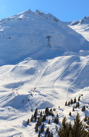 View of snow covered Courchevel slope in French Alps. Ski Resort Courchevel