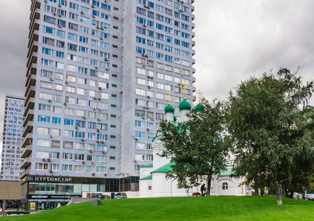 Twenty-four storey residential building and the Church of Simeon. New Arbat Street. Moscowのeditorial素材
