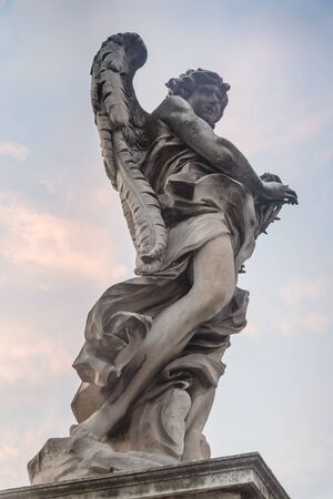 Sculpture of an angel on the bridge of Sant'Angelo in Rome, Italyの写真素材