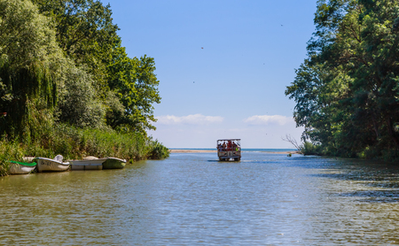 Boat for trip on the river. Kamchia river in Bulgariaのeditorial素材