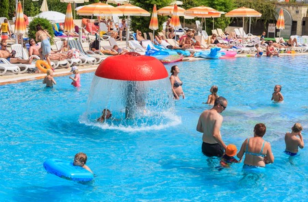 People swim in pool of hotel Flamingo Grand Hotel at summer sunny day. Albena, Bulgariaのeditorial素材