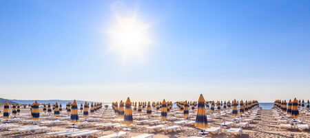 The Black Sea shore, blue clear water, beach with sand, umbrellas and sunbeds. Morning. Resort Albena, Bulgariaのeditorial素材