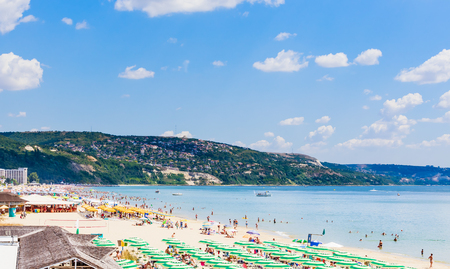 The Black Sea shore, blue clear water, beach with sand, umbrellas and sunbeds. Albena, Bulgariaのeditorial素材
