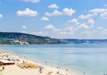The Black Sea shore, blue clear water, beach with sand, umbrellas and sunbeds. Albena, Bulgariaのeditorial素材