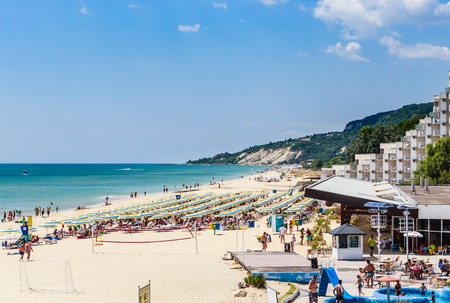 The Black Sea shore, blue clear water, beach with sand, umbrellas and sunbeds. Albena, Bulgariaのeditorial素材