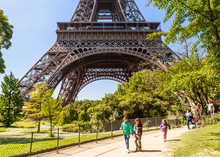 People are walking in the park around Eiffel Tower. France, Parisのeditorial素材
