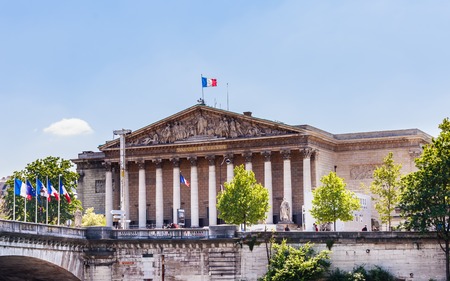 The National Assembly palace (Palais Bourbon) a government building located, on the left bank of the Seine. View from the water. Paris. Franceのeditorial素材