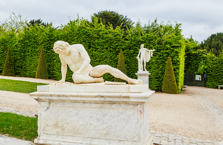  One of many sculptures in the antique style, located in the gardens of Versaillesの写真素材