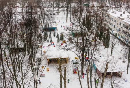 Children in the playground in the kindergarten in the winter. Moscow, Russiaの写真素材