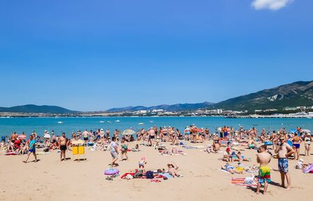 People resting on beach of resort the Black Sea Coast of Gelendzhik town. Krasnodar region, Russiaのeditorial素材