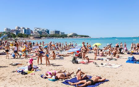 People resting on beach of resort the Black Sea Coast of Gelendzhik town. Krasnodar region, Russiaのeditorial素材