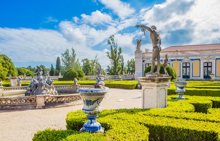 The National Palace of Queluz - Lisbon - Portugal. Fragment of Neptunes Fountain and the Ceremonial Facade of the Corps de Logis designed by Oliveiraのeditorial素材