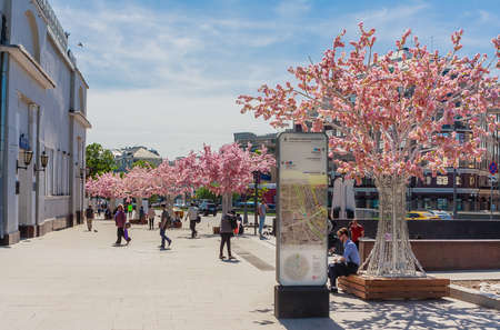 City decoration in front of the Khudozhestvenny cinema building on Arbat Square. Moscow, Russia.のeditorial素材