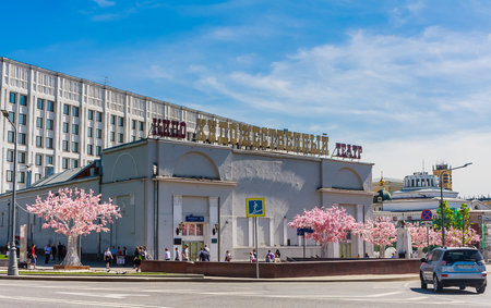 View of the buildings of the Khudozhestvenny cinema on Arbat Square. In the background, the General Staff of the Armed Forces of the Russian Federation. Moscow, Russia.のeditorial素材